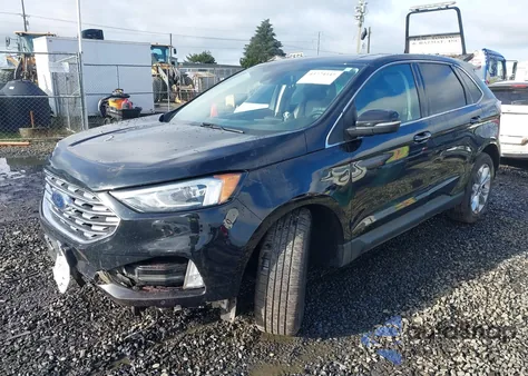 2021 Ford Edge Titanium z USA, uszkodzony, nr VIN 2FMPK4K93MBA27270